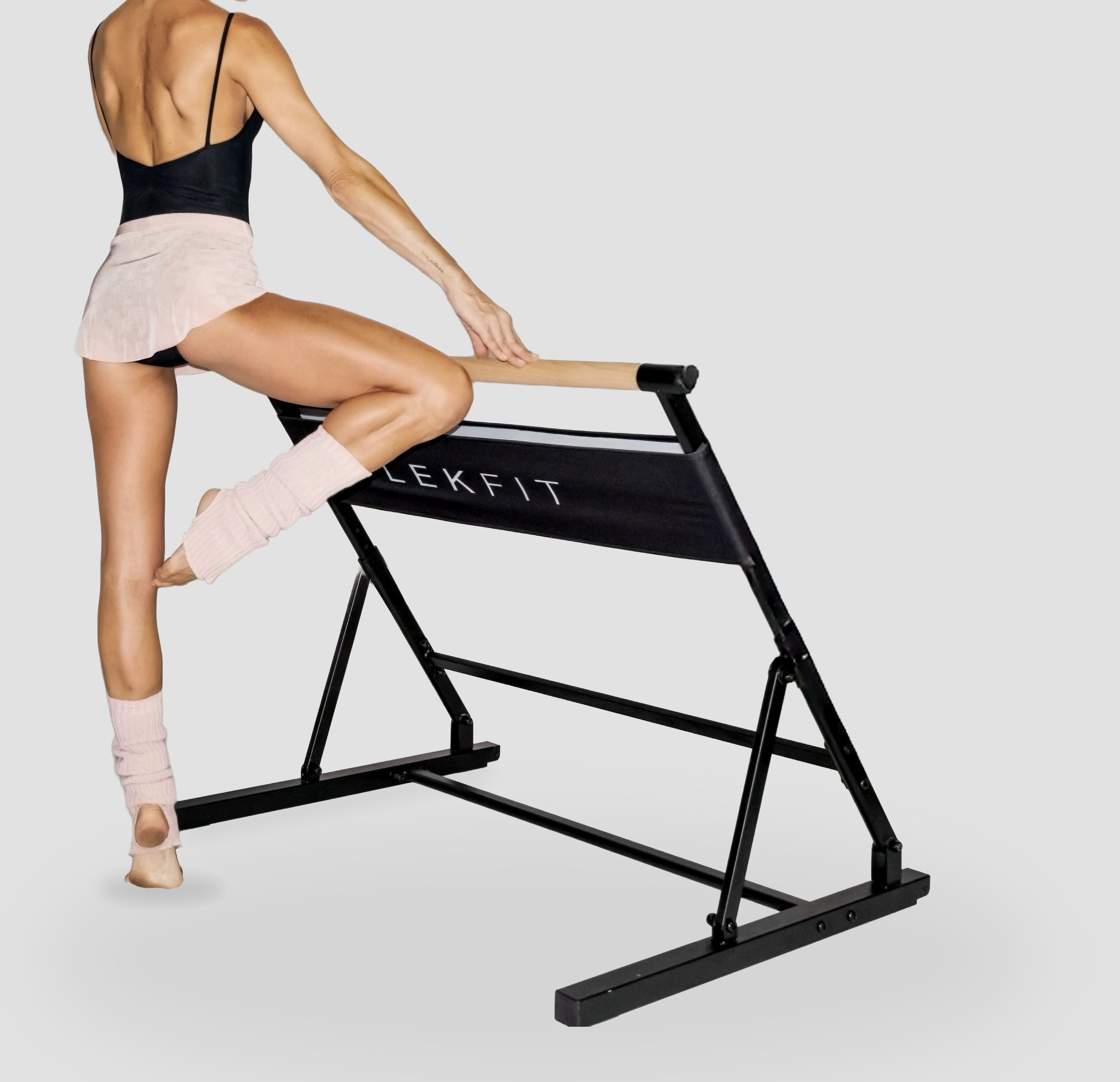 Lauren demonstrating a barre movement at the LEKFIT barre